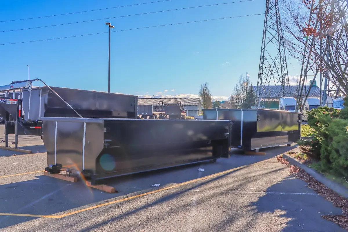 Roll-off dumpster ready for waste disposal at job site for 12 Yard Dumpster Rental in East Hampton